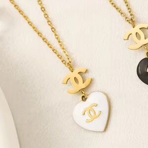 Gold Necklace with White Heart Pendants